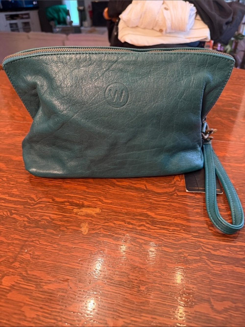 Wanderers Travel Co. teal blue leather clutch or toiletry bag